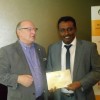 Mike Watson SVT CEO presents Anil Kumar winner of the Golden Ticket